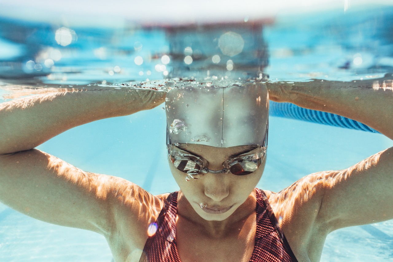 Swim Cap: Why do we need it and how to put it on?